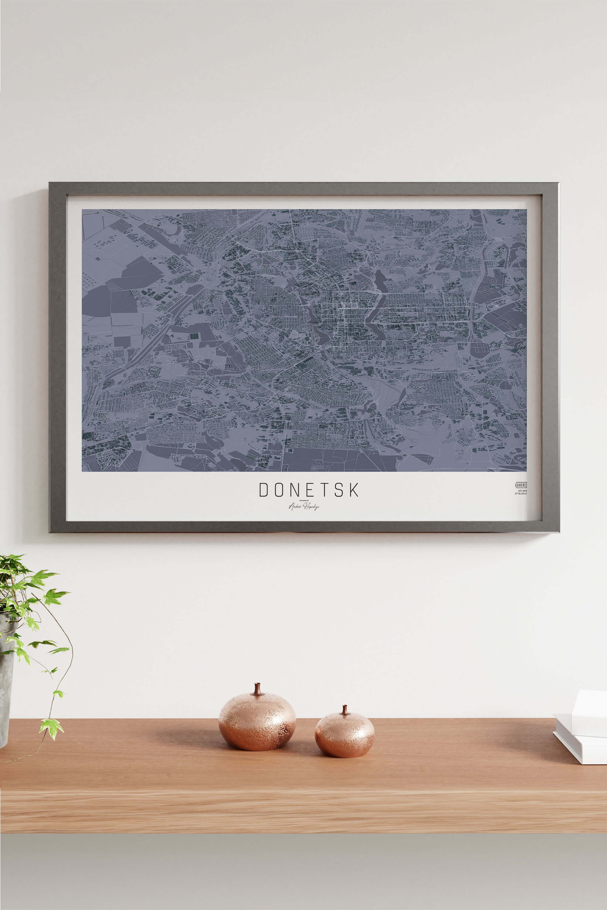 графітова 3д картина міста Донецьк в рамці на підлозі