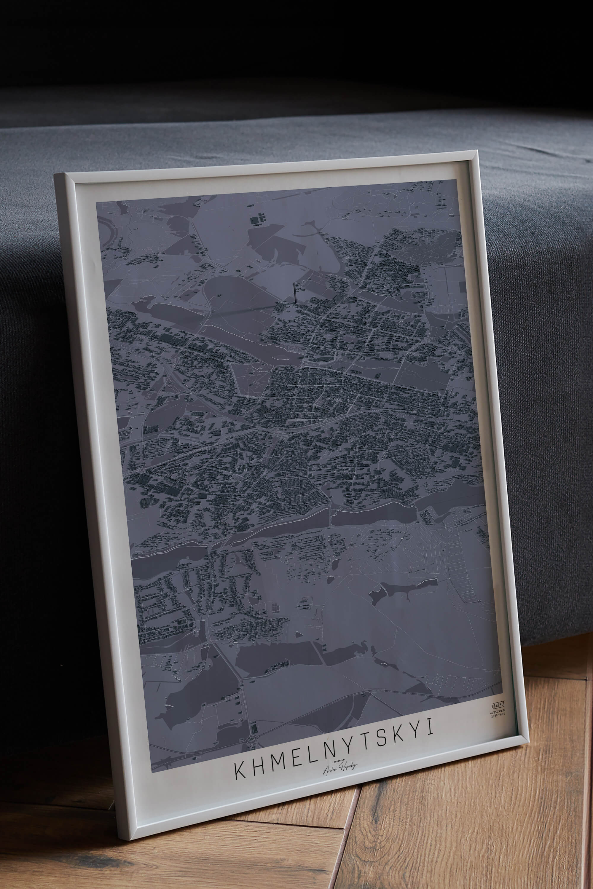 графітова 3д картина міста Суми в рамці на підлозі
